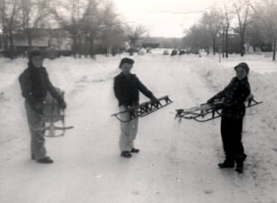 Winter on Pine Street in Yankton, SD circa 1948 John J. Hohn on left